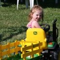 Amber takes a spin on the tractor